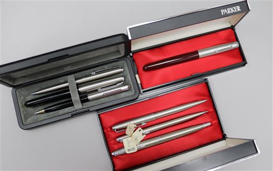 A collection of Parker pens.